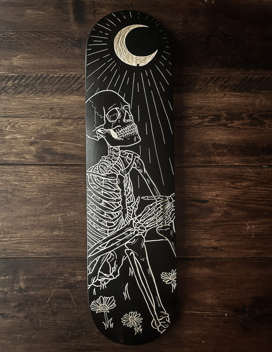 The Skeleton and the Moon Skate Deck