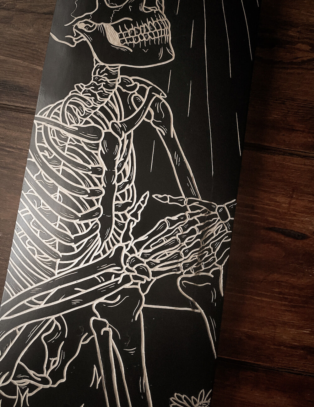 The Skeleton and the Moon Skate Deck